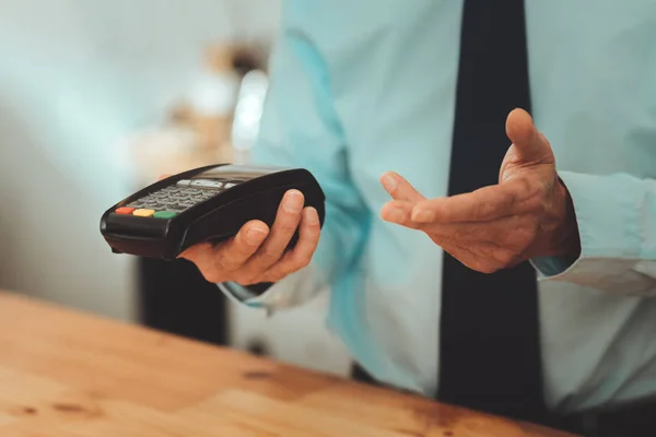 View of hand pointing at payment terminal — Stock Photo, Image