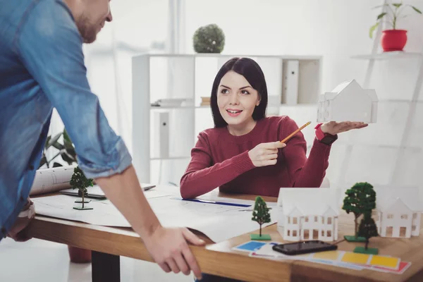 Nice smart woman presenting a housing project — Stock Photo, Image