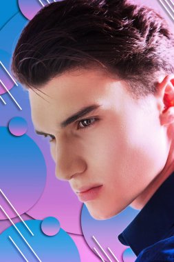 Genç adam değişen dünya arka plan üzerinde konsantre