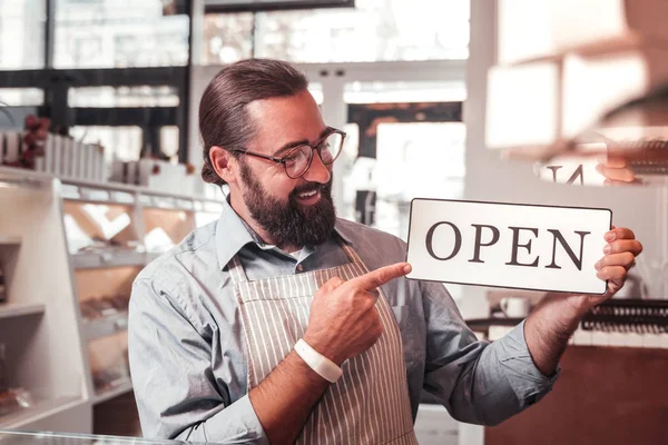 Cafe owner is happy to start his business