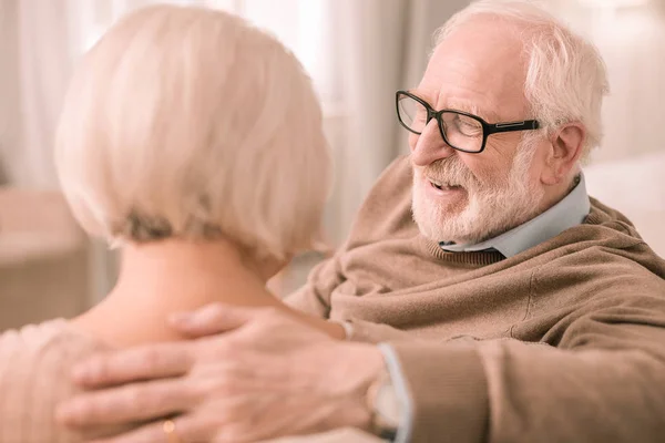 Joyful bearded man keeping smile on his face — Stock Photo, Image