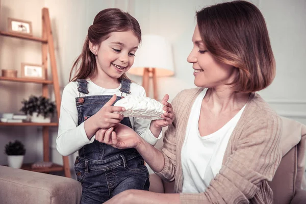 Cute smart girl asking her mother for help — Stock Photo, Image