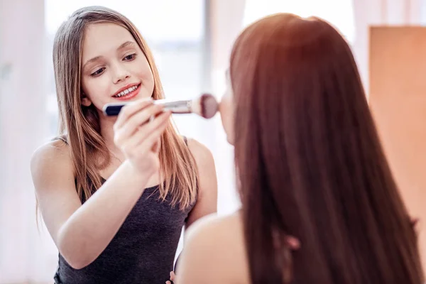 Inspired two girls getting rid of redness — Stock Photo, Image