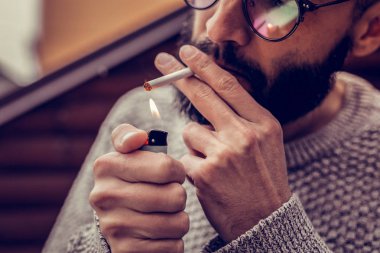 Close up of a lighter being in use