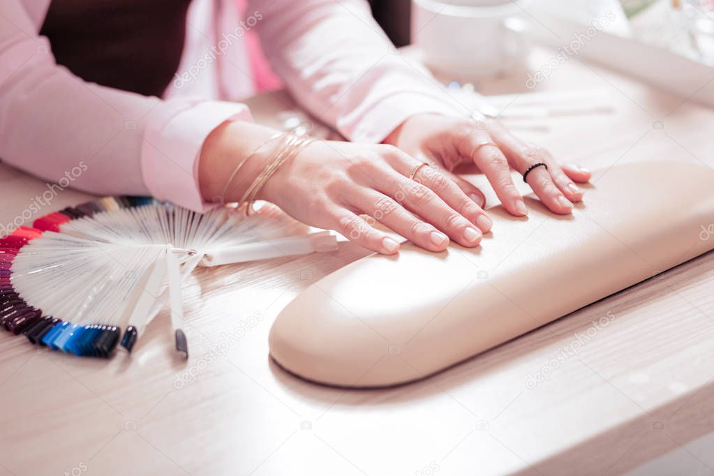 Top view of hands ready for the procedure