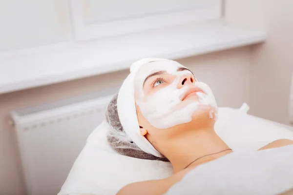 Nice serious woman waiting for the beautician to come — Stock Photo, Image