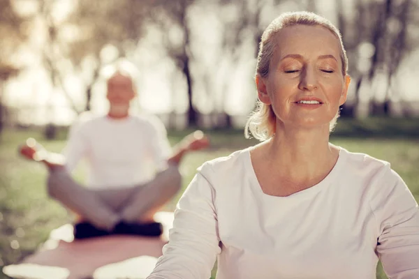 Portrait of charming woman that doing yoga — Stock Photo, Image