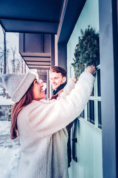 Happy wife feeling satisfied while having her own private house — Stock Photo, Image