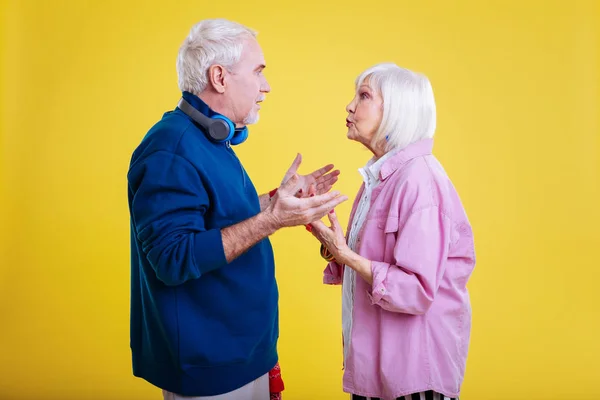 Pensioners having little fight about present for grandchildren