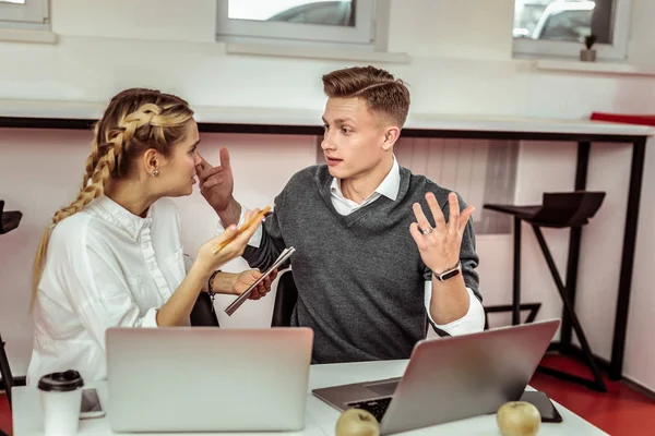 Scandalous active workmates having discussion at work — Stock Photo, Image