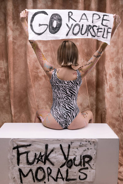 Nice young woman turning her back to you