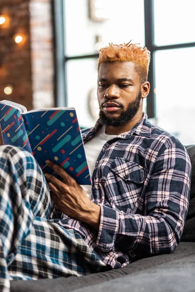 Nice smart man getting new knowledge from the book