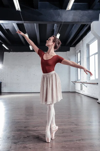 Beautiful graceful young dancer keeping her balance — Stock Photo, Image