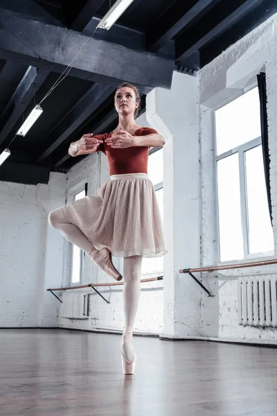 Nice serious ballerina preparing to do a pirouette — Stock Photo, Image