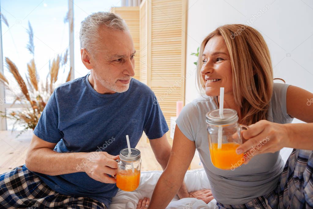 Appealing wife feeling amazing spending morning with husband