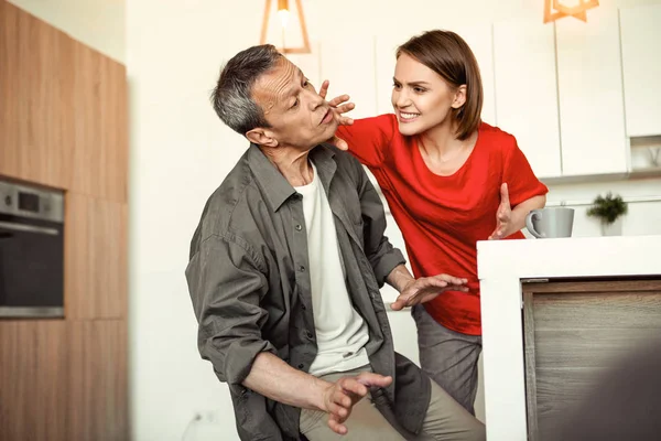 Mad crazy woman slapping face of her shocked husband — Stock Photo, Image