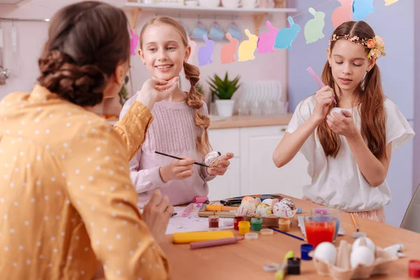 Positive delighted little female looking at her mother — Stock Photo, Image