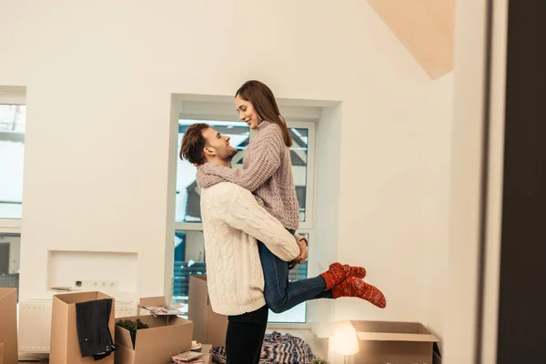 Couple feeling memorable having first night in new house — Stock Photo, Image