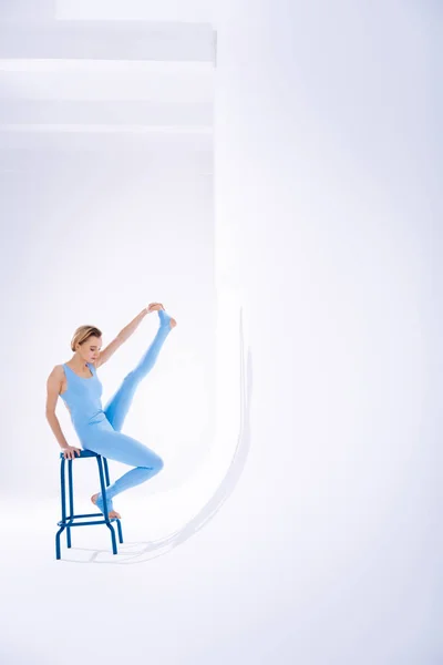 Professional skillful female gymnast having her training — Stock Photo, Image