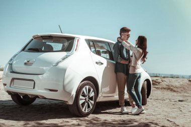 Concentrated brunette man listening to his partner