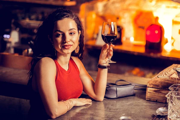 Woman drinking wine in the bar while waiting for man — 스톡 사진