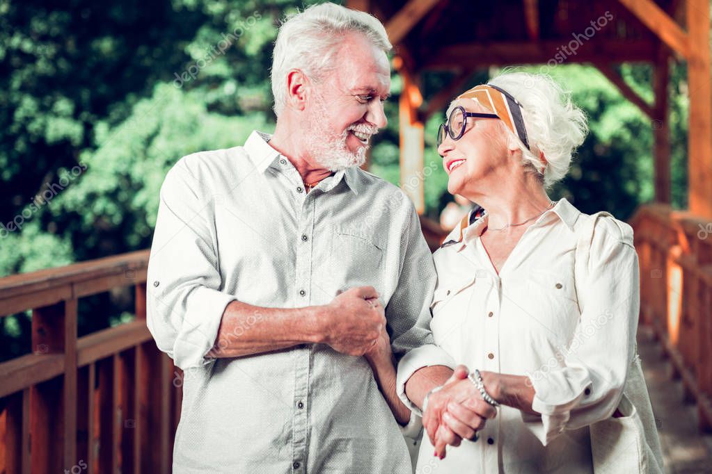 Face portrait of couple looking at each other during walking