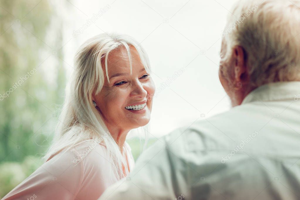 Joyful happy woman enjoying time with her husband