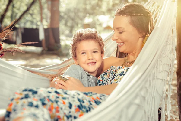 Joyful cute boy being together with his mom — Stock Photo, Image