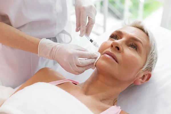 Nice aged woman having a contour plastic — Stock Photo, Image