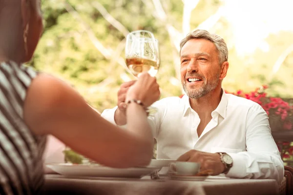 Successful businessman feeling relieved having romantic date with wife — Stock Photo, Image