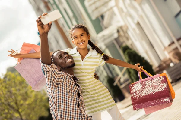 Positive delighted brunette girl looking at camera — Stock Photo, Image