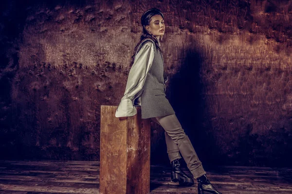 Pleasant attractive woman leaning on the stool — Stock Photo, Image