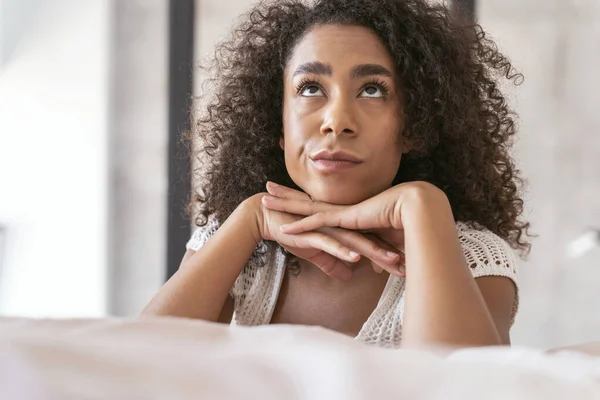 Emotional brunette girl being in her bedroom — Stock Photo, Image