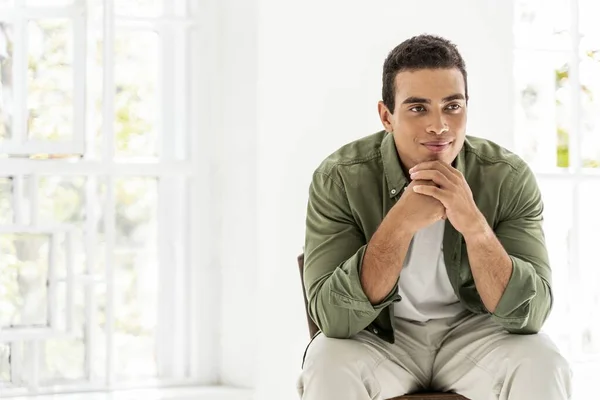 Young man waiting for his guests at home — Stock Photo, Image