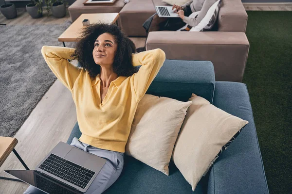 Lady with a laptop in the office