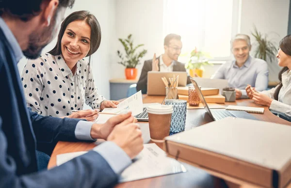 Business people discussing over new business project in office — Stock Photo, Image