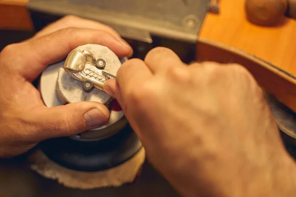 Experienced professional engraver working in a shop — Stock Photo, Image