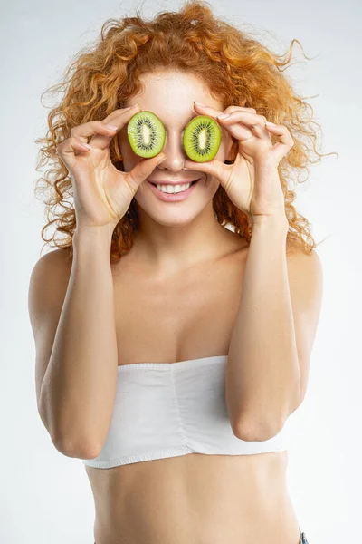 Female in a strapless bra enjoying her cosmetic procedure — Stock Photo, Image