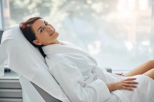 Smiling spa client posing for the camera — Stock Photo, Image