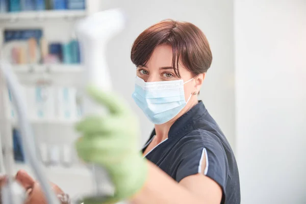 Dental Clinic Worker With Face Mask - a Royalty Free Stock Photo from  Photocase