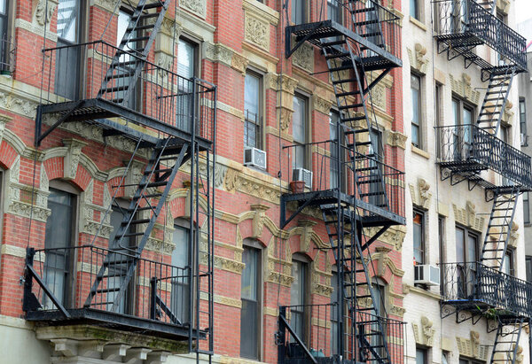 Fire escape and stairs on exterior of walk up apartment building