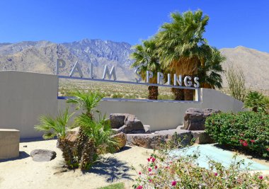 Palm Springs sign with desert background and backdrop of San Jacinto Mountain, California clipart