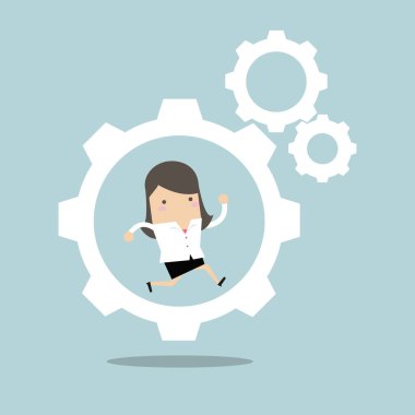 İşkadını dişli makine çalışıyor.