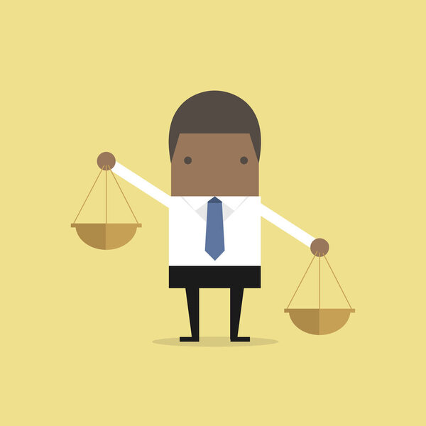 African businessman carrying a balance scale with both hands.