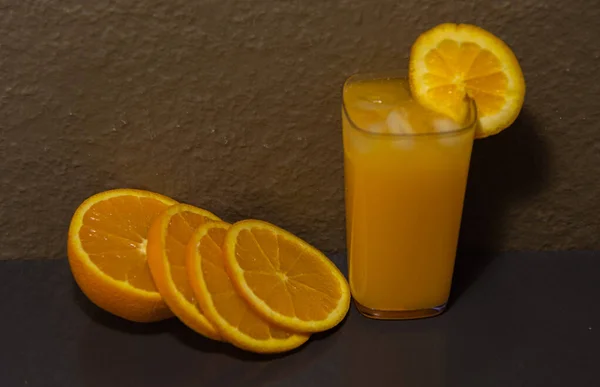 Orange juice and fruits. Refreshing drink. Source of vitamin C. Refreshing drink.