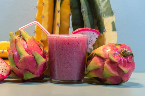 Pitaya juice and fresh fruits. Pitaya juice is rich in vitamins and is great for health. Detox and low calorie drink. Exotic and refreshing drink. Dragon fruit.