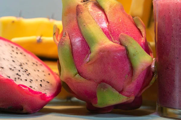 Pitaya juice and fresh fruits. Pitaya juice is rich in vitamins and is great for health. Detox and low calorie drink. Exotic and refreshing drink. Dragon fruit.