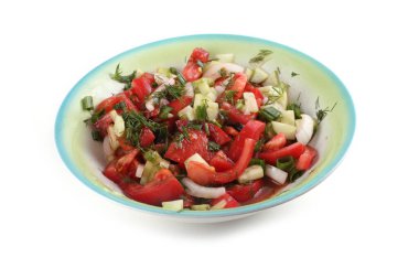 Beyaz tenli tencere içinde salata