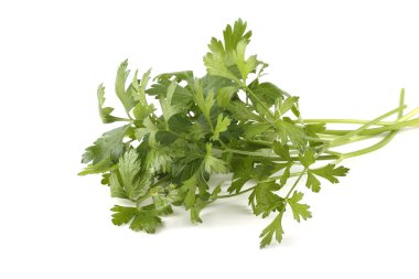 Beyaz arkaplanda izole edilmiş bir maydanoz demeti