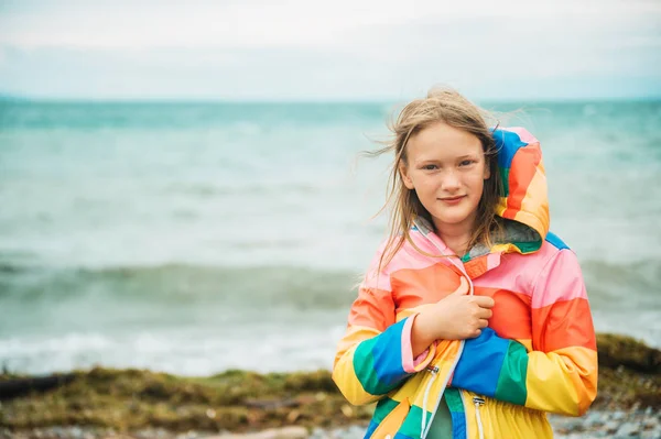 Cute Little Girl Playing Lake Windy Day Wearing Colorful Parka — Stock Photo, Image